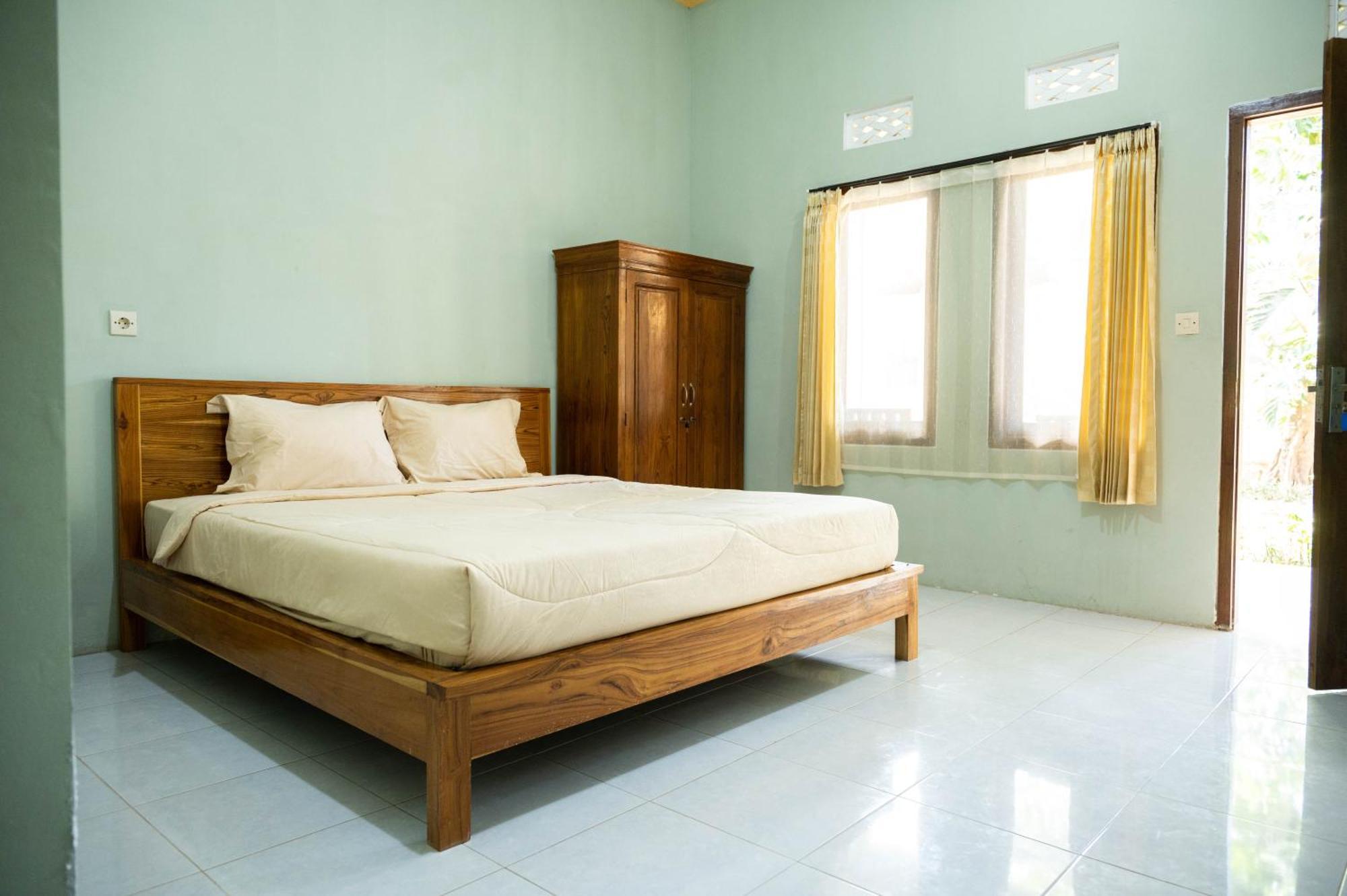 Join Homestay Kuta  Luaran gambar