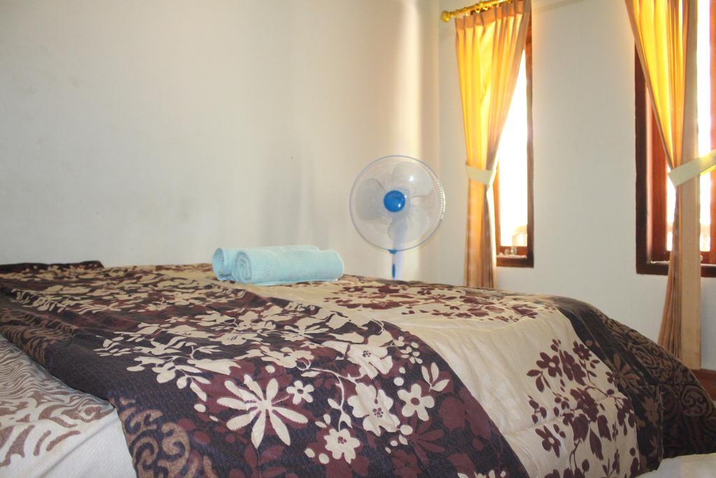 Join Homestay Kuta  Luaran gambar